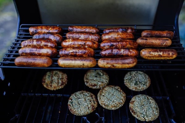 Brautwurst And Burgers On A Grill